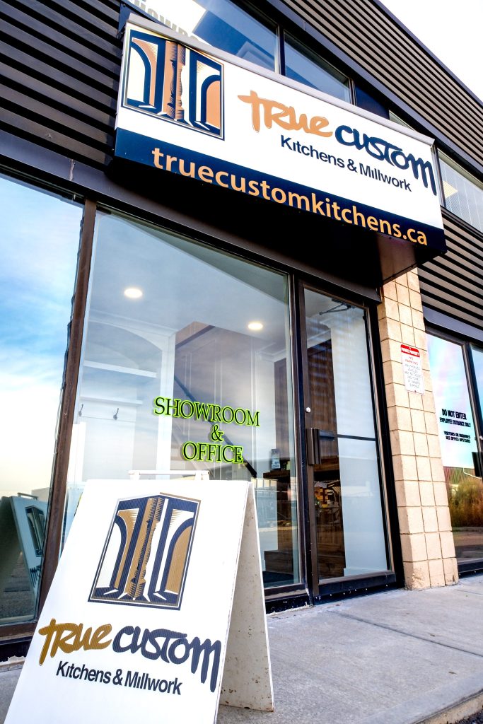 Cabinetry displays inside the True Custom Calgary showroom